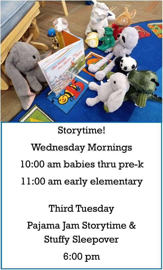 Stuffed animals with a book